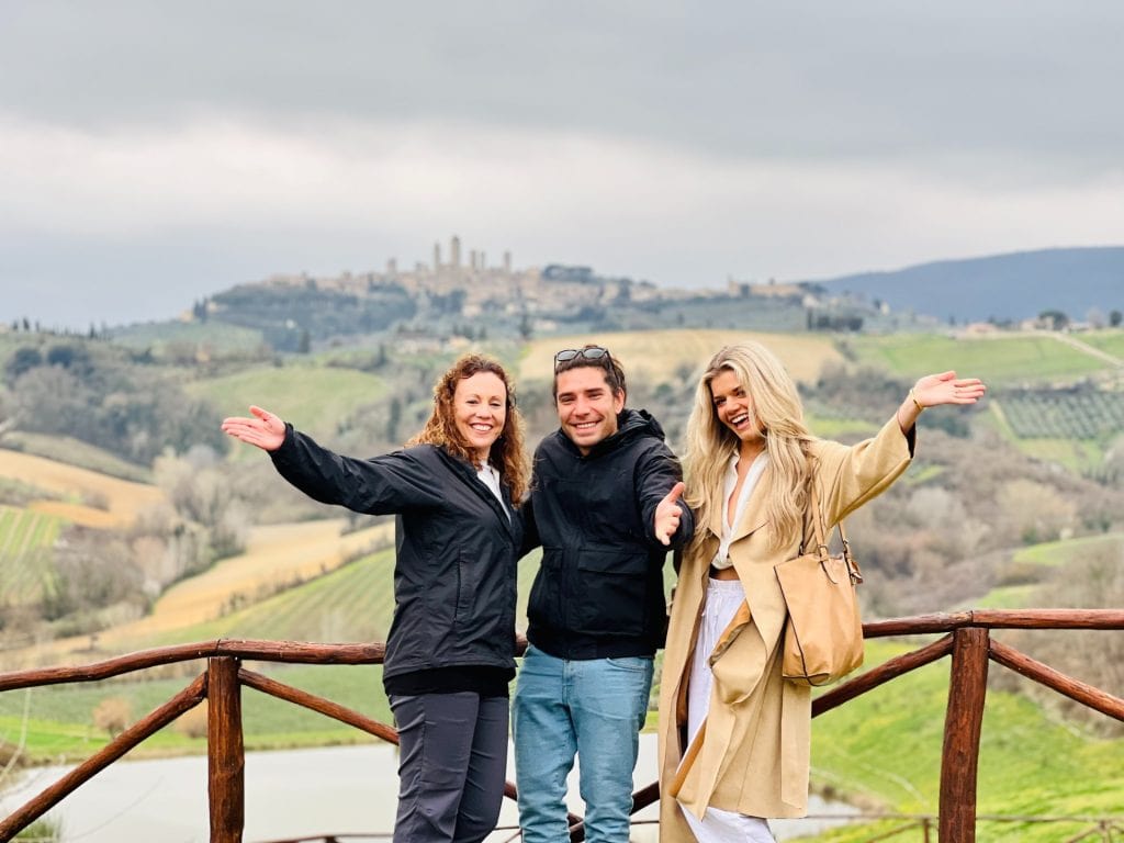 Family Having Fun In San Gimignano Tuscany